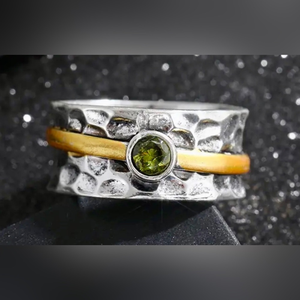 SILVER AND BRASS BAND WITH GREEN CUBIC ZIRCONIA